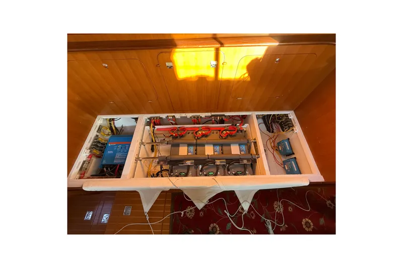 Pratique Yacht Photos Pics Electrical system of a 2012 Outbound 46 yacht, showcasing wiring and components.