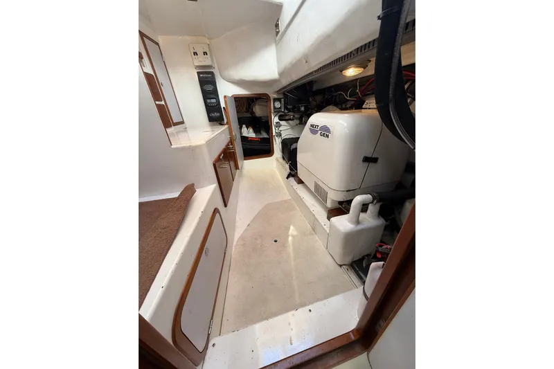 Pratique Yacht Photos Pics Engine room of 2012 Outbound 46 yacht with Next Gen generator.