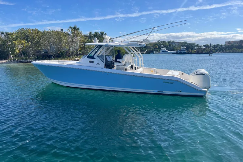  Yacht Photos Pics 2019 Pursuit S 368 Sport boat on clear blue water, sunny day.