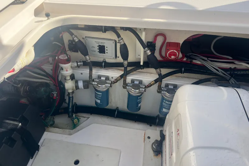  Yacht Photos Pics 2019 Pursuit S 368 Sport engine compartment with Yamaha fuel filters and wiring.