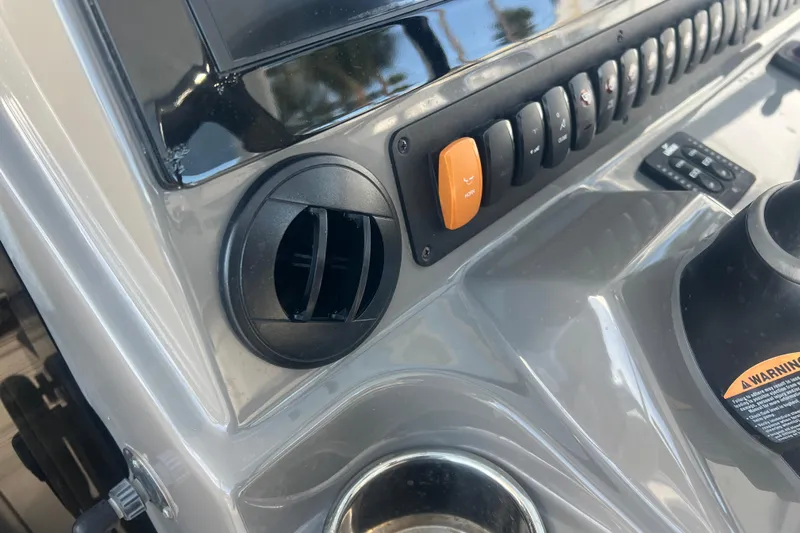  Yacht Photos Pics Control panel of 2019 Pursuit S 368 Sport boat with switches and air vent.