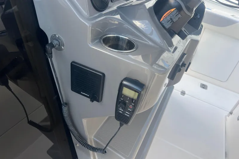  Yacht Photos Pics 2019 Pursuit S 368 Sport boat console with Garmin radio and controls.