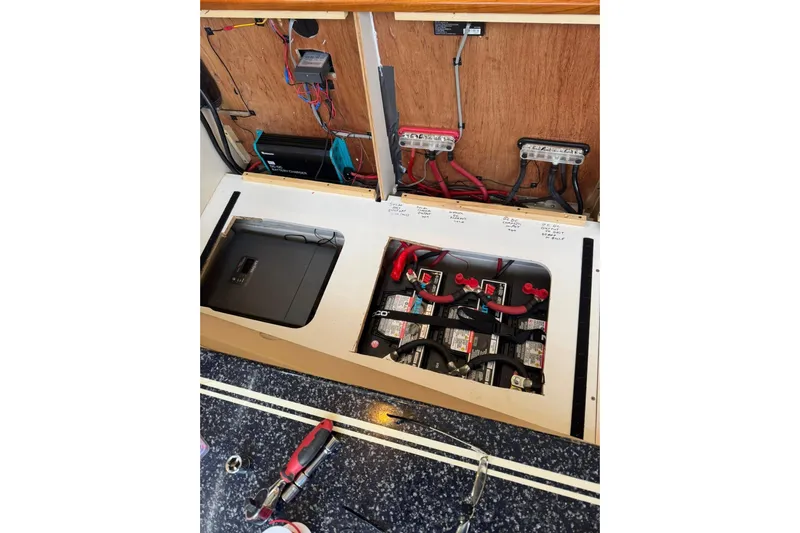  Yacht Photos Pics Electrical system of a 2000 Carver 404 Cockpit Motor Yacht, showing batteries and wiring.