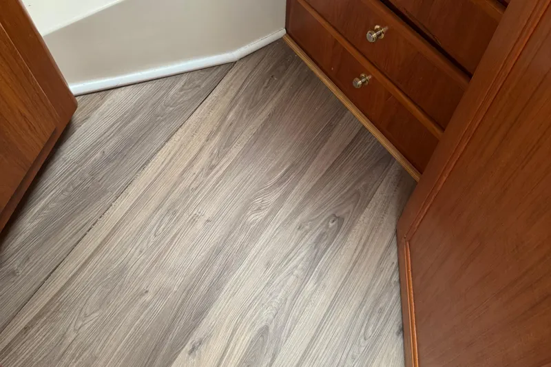  Yacht Photos Pics Wooden flooring and cabinetry inside a 2000 Carver 404 Cockpit Motor Yacht.