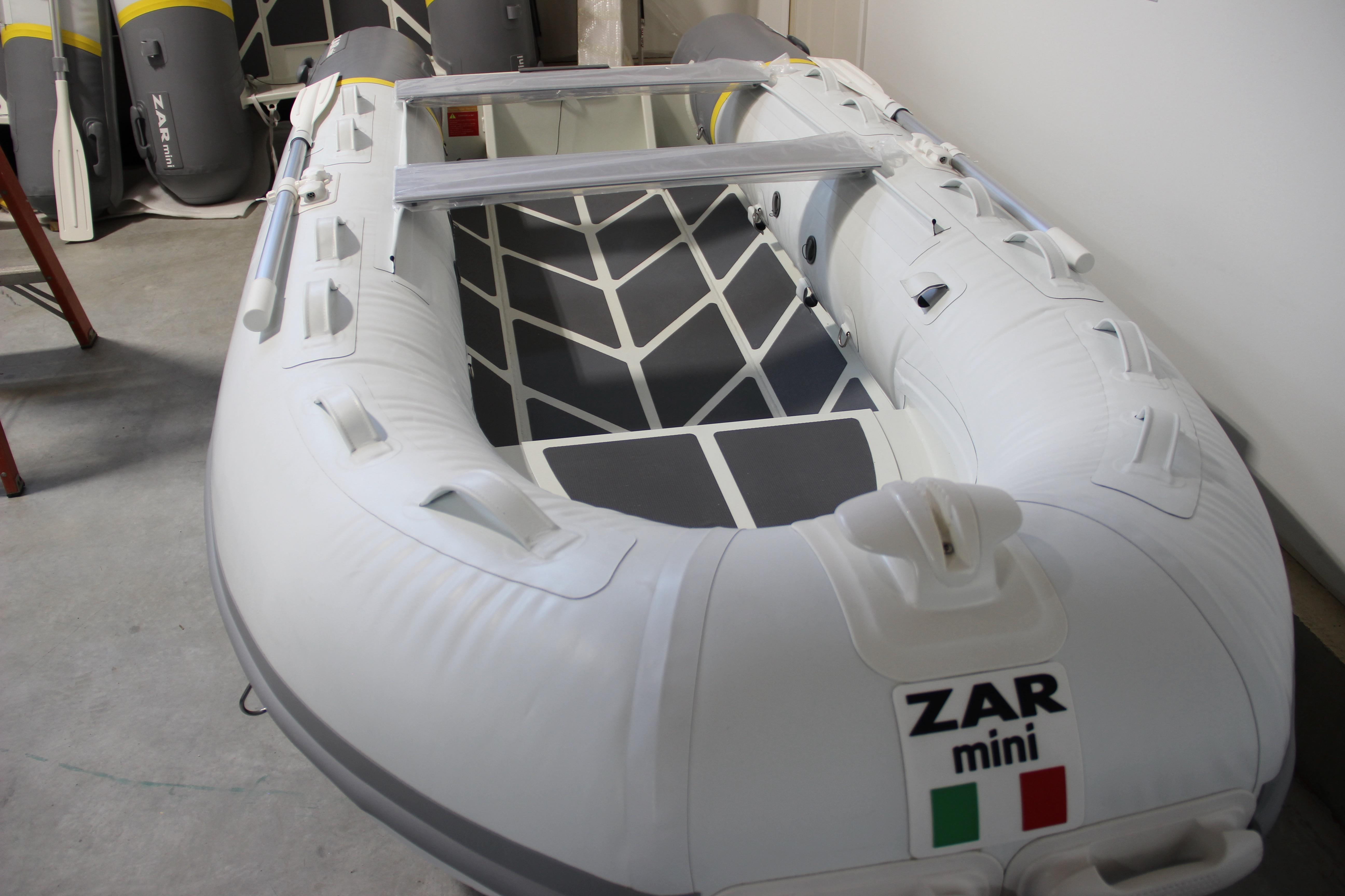2022 ZAR Mini RIB 12 HDL inflatable boat in a showroom.