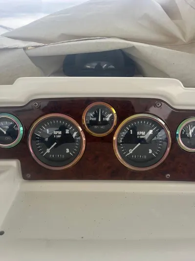 Permanent Waves Yacht Photos Pics Dashboard of 2000 Carver 440 Hardtop Express with RPM gauges and instruments.