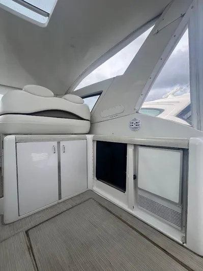 Permanent Waves Yacht Photos Pics Interior of 2000 Carver 440 Hardtop Express yacht, featuring sleek cabinetry and modern design.