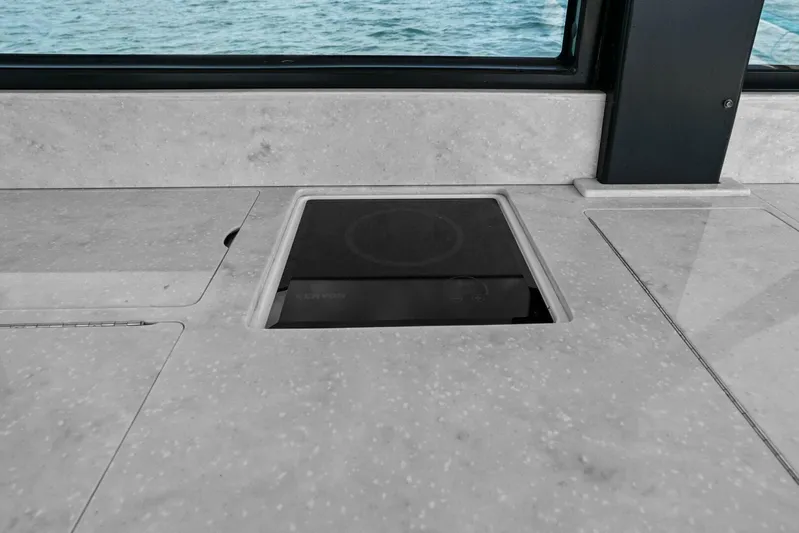 Over The Top Yacht Photos Pics Marble countertop with built-in appliance on a 2021 Regal 36 boat.