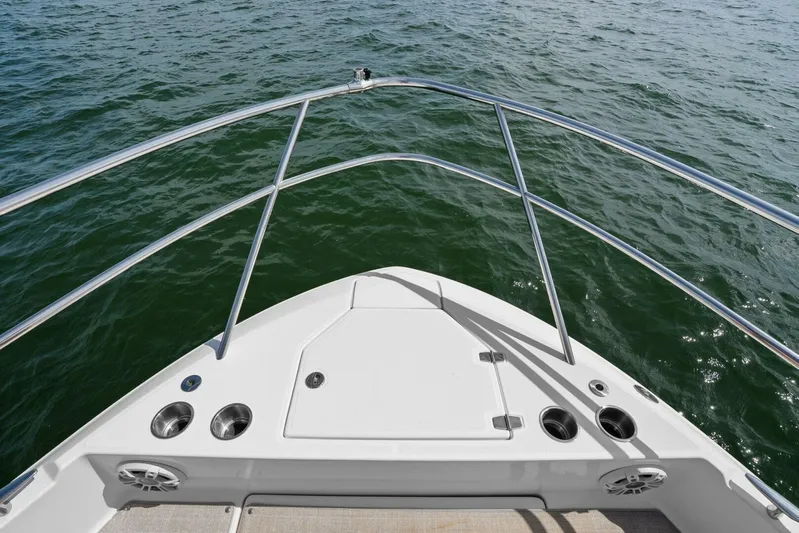 Over The Top Yacht Photos Pics Bow view of 2021 Regal 36 boat on open water.