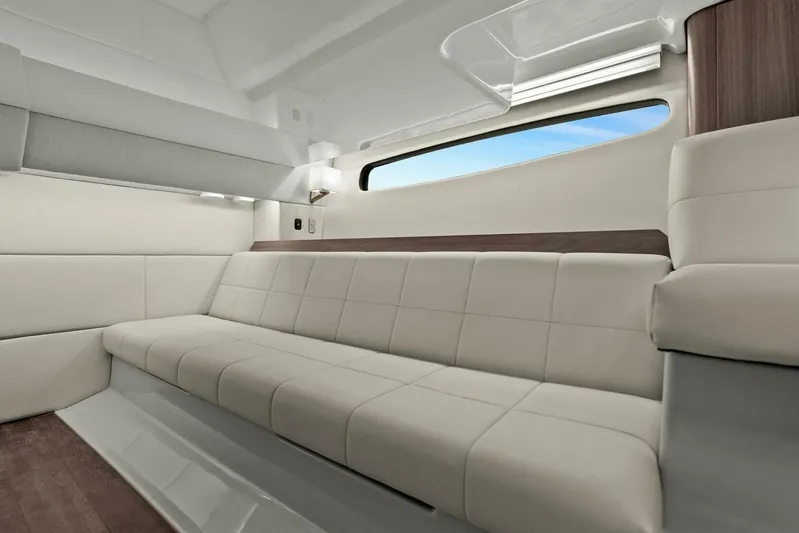 Over The Top Yacht Photos Pics Luxurious interior of 2021 Regal 36 yacht with plush seating and modern design.