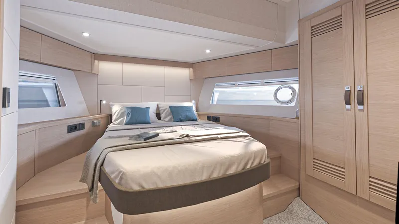  Yacht Photos Pics Luxurious bedroom in 2025 Beneteau Swift Trawler 54 yacht, featuring modern design and cozy ambiance.