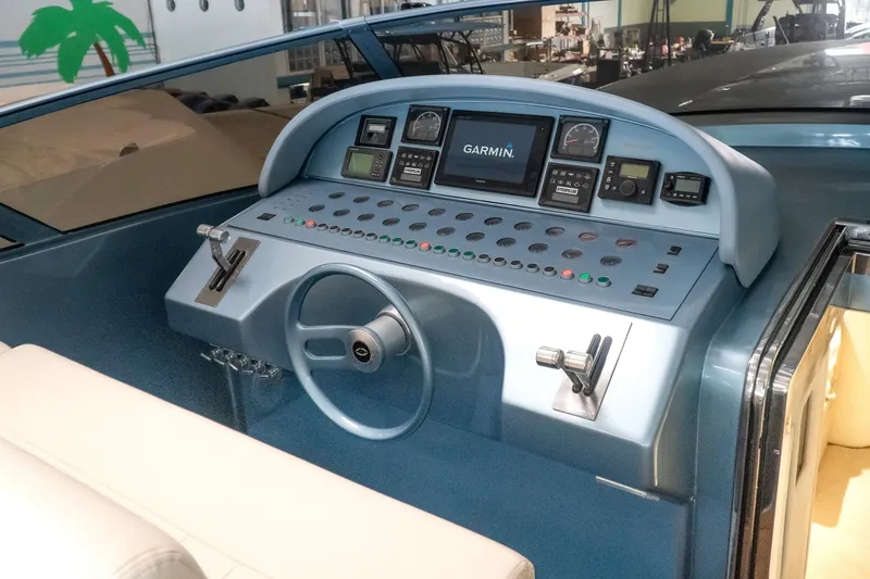  Yacht Photos Pics Control panel of a 1997 Magnum 56 boat with Garmin navigation system.