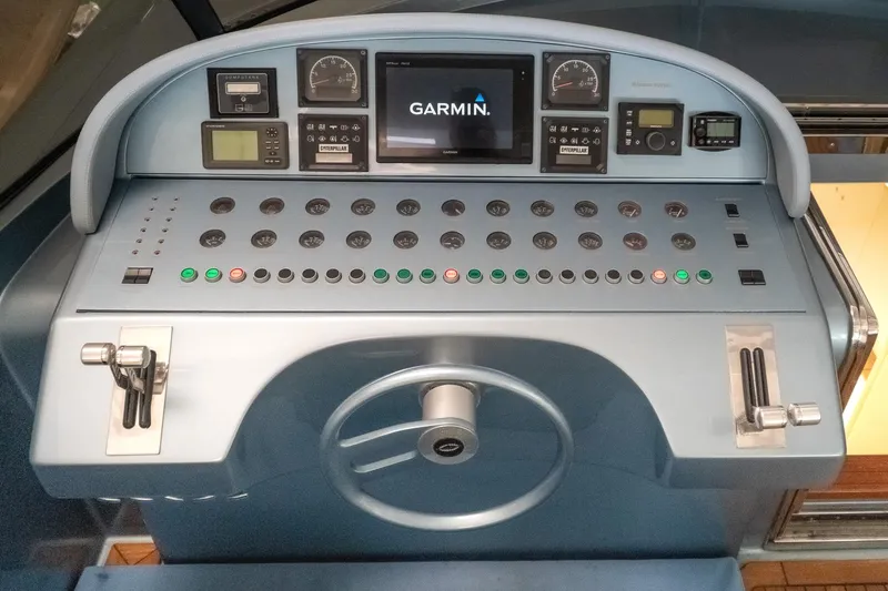  Yacht Photos Pics Control panel of a 1997 Magnum 56 yacht with Garmin navigation system.