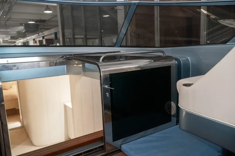  Yacht Photos Pics Interior of a 1997 Magnum 56 yacht, featuring sleek design and modern amenities.