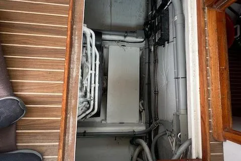 Tere Sue Yacht Photos Pics 2007 Northern Bay Hardtop Cruiser engine room with visible piping and equipment.