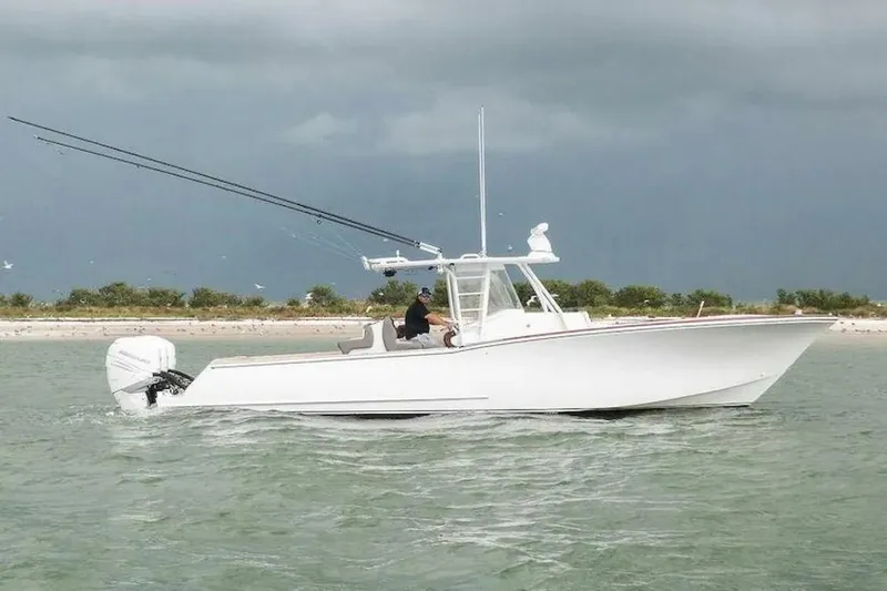 Surreel Yacht Photos Pics 2016 Bonadeo 37 Custom Carolina YT WalkAround boat on water, side view.