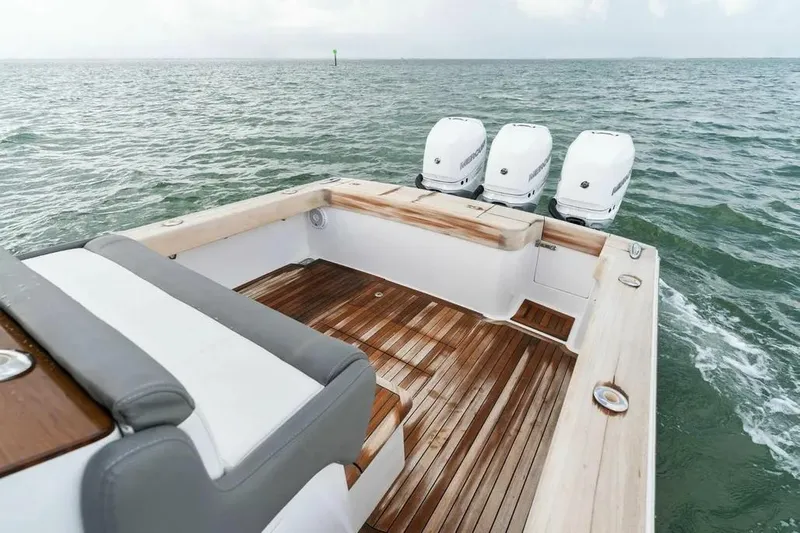 Surreel Yacht Photos Pics 2016 Bonadeo 37 Custom Carolina YT WalkAround boat with triple engines on open water.