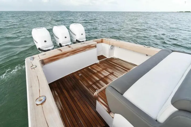 Surreel Yacht Photos Pics 2016 Bonadeo 37 Custom Carolina YT WalkAround with triple outboard engines on open water.