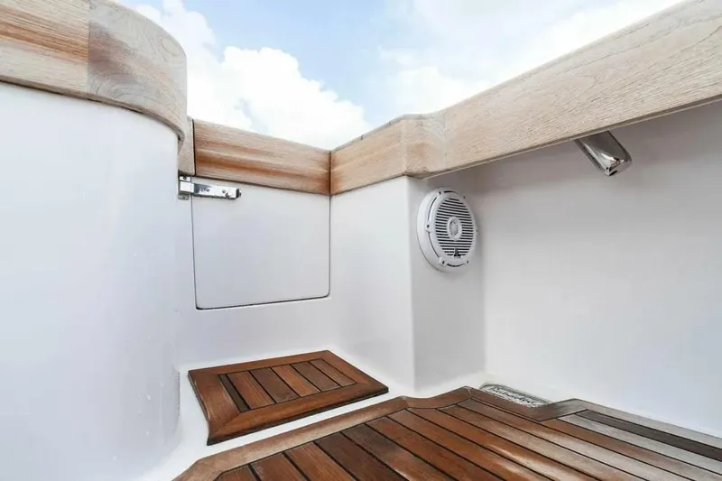 Surreel Yacht Photos Pics 2016 Bonadeo 37 Custom Carolina YT WalkAround, featuring teak flooring and sleek white interior.