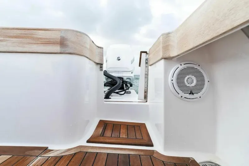 Surreel Yacht Photos Pics 2016 Bonadeo 37 Custom Carolina YT WalkAround, teak deck, marine speaker, and engine view.