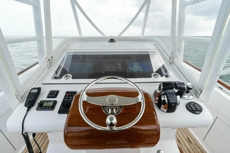 Surreel Yacht Photos Pics 2016 Bonadeo 37 Custom Carolina YT WalkAround helm with navigation controls and steering wheel.