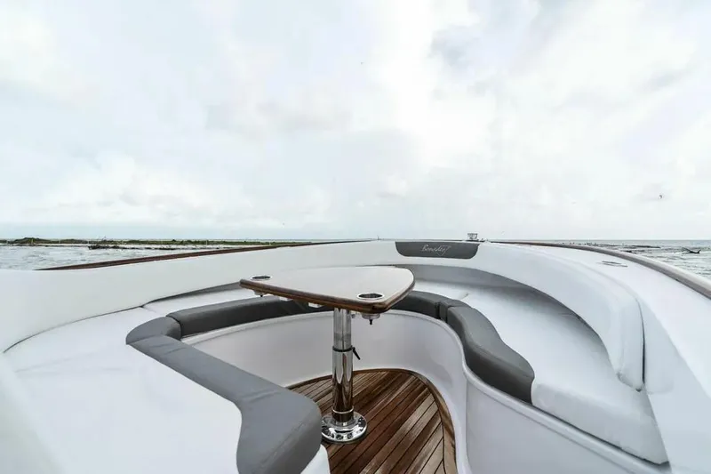 Surreel Yacht Photos Pics 2016 Bonadeo 37 Custom Carolina YT WalkAround boat interior with seating and table.