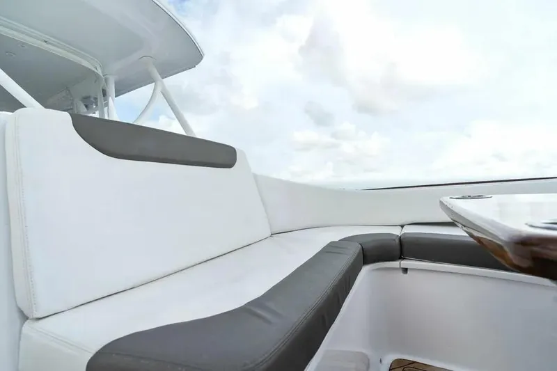 Surreel Yacht Photos Pics 2016 Bonadeo 37 Custom Carolina YT WalkAround, featuring sleek seating and table design.