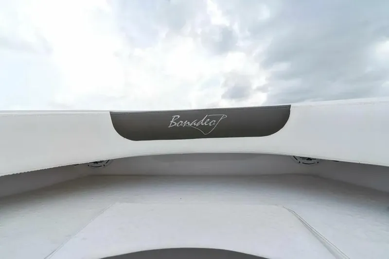 Surreel Yacht Photos Pics 2016 Bonadeo 37 Custom Carolina YT WalkAround boat with cloudy sky backdrop.