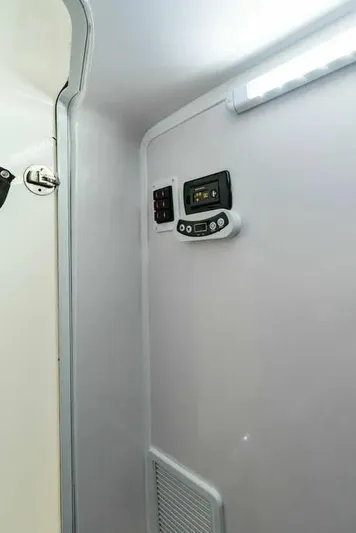 Surreel Yacht Photos Pics Interior of 2016 Bonadeo 37 Custom Carolina YT WalkAround with control panel and lighting.