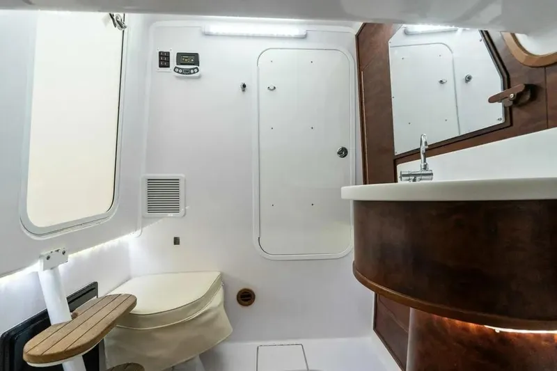 Surreel Yacht Photos Pics Interior of 2016 Bonadeo 37 Custom Carolina YT WalkAround, featuring a modern bathroom design.