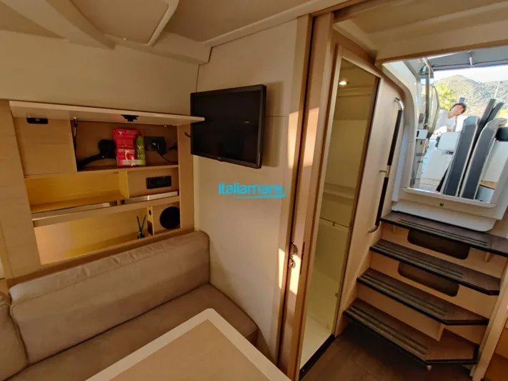  Yacht Photos Pics Interior of 2020 Jeanneau Leader 36 yacht, featuring cozy seating and modern amenities.