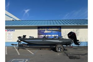 2026 Ranger RT188P fishing boat on trailer outside a marine store.