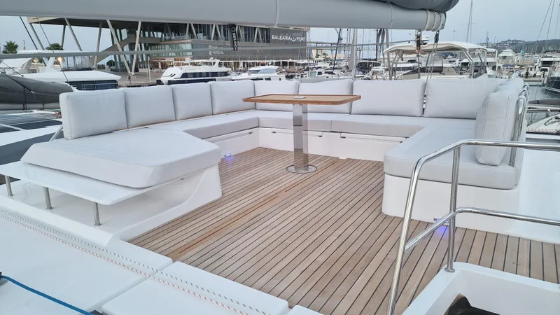  Yacht Photos Pics Luxurious seating area on 2026 Aventura 45 yacht with wooden deck and modern design.