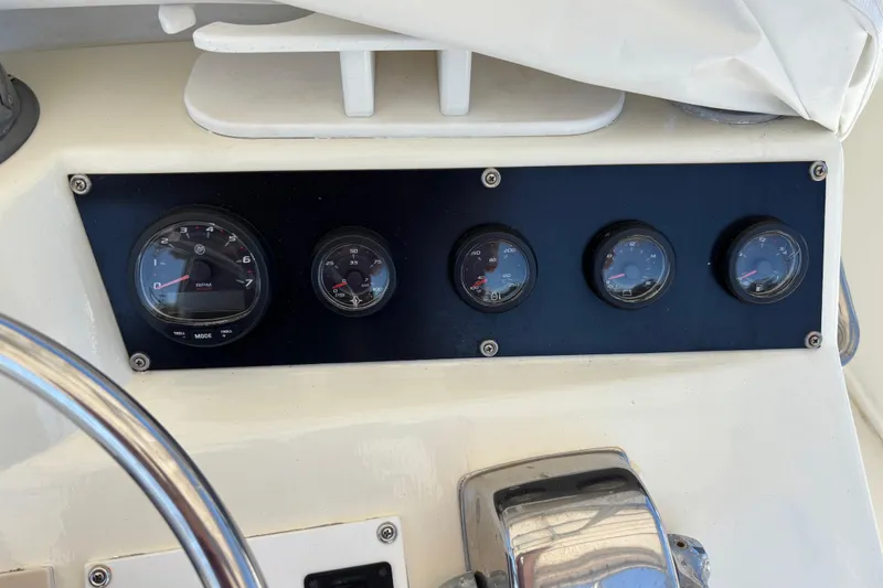  Yacht Photos Pics Dashboard gauges of a 1985 Egg Harbor 37 Tournament boat.