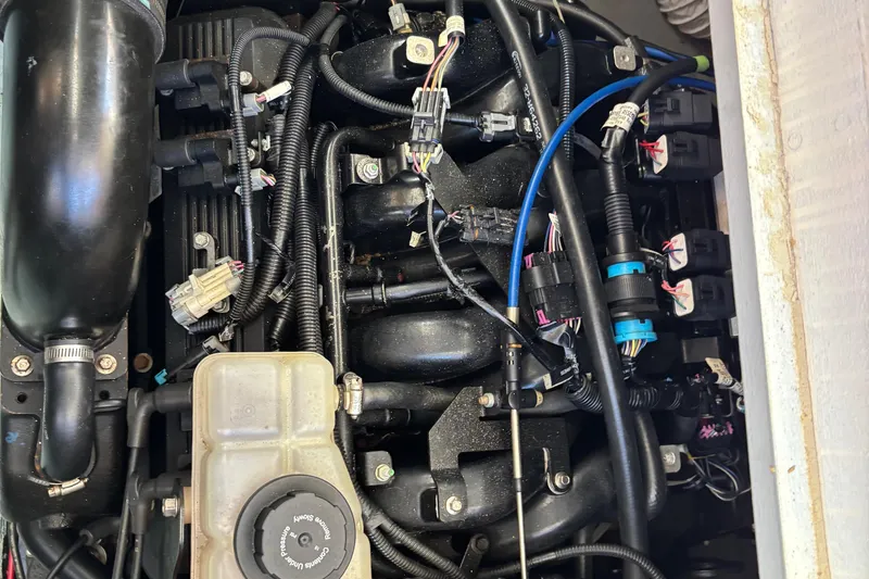  Yacht Photos Pics Engine components of a 1985 Egg Harbor 37 Tournament boat, featuring wiring and hoses.