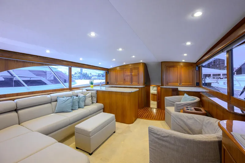  Yacht Photos Pics Luxurious interior of 2006 Blackwell Custom Carolina yacht with elegant wood finishes and plush seating.