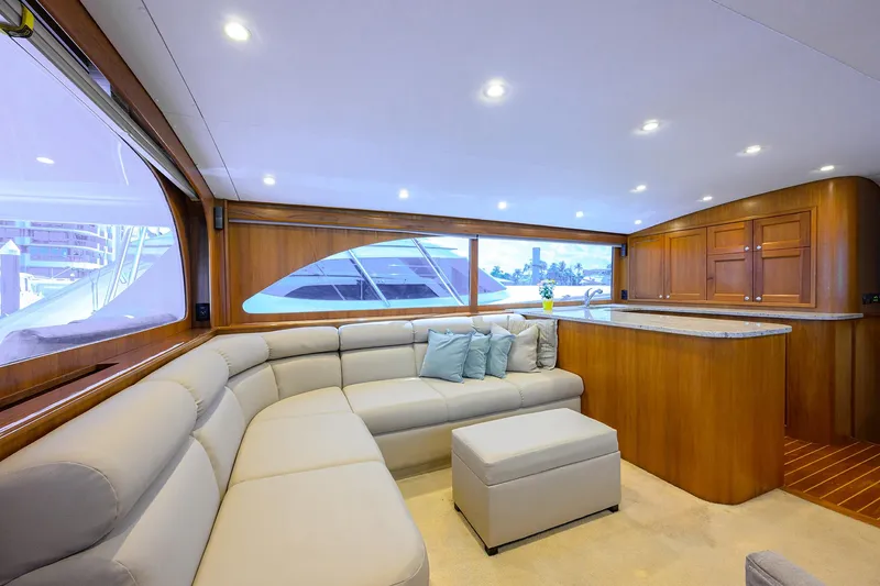  Yacht Photos Pics Luxurious interior of 2006 Blackwell Custom Carolina yacht with plush seating and elegant wood finishes.