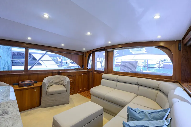  Yacht Photos Pics Luxurious interior of 2006 Blackwell Custom Carolina yacht with plush seating and wood accents.