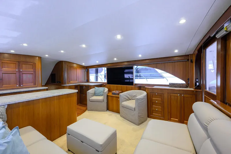  Yacht Photos Pics Luxurious interior of 2006 Blackwell Custom Carolina yacht with elegant wood finishes and modern seating.