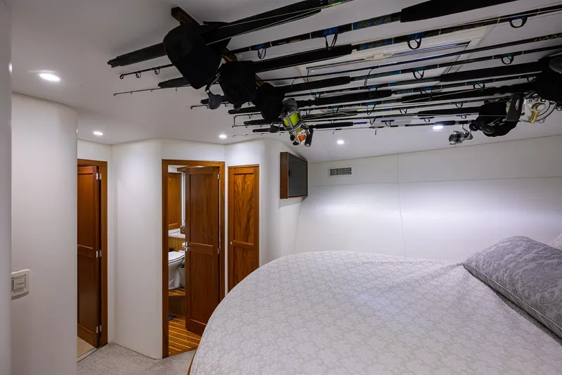  Yacht Photos Pics Luxurious 2006 Blackwell Custom Carolina yacht interior with fishing rods and elegant wood finishes.