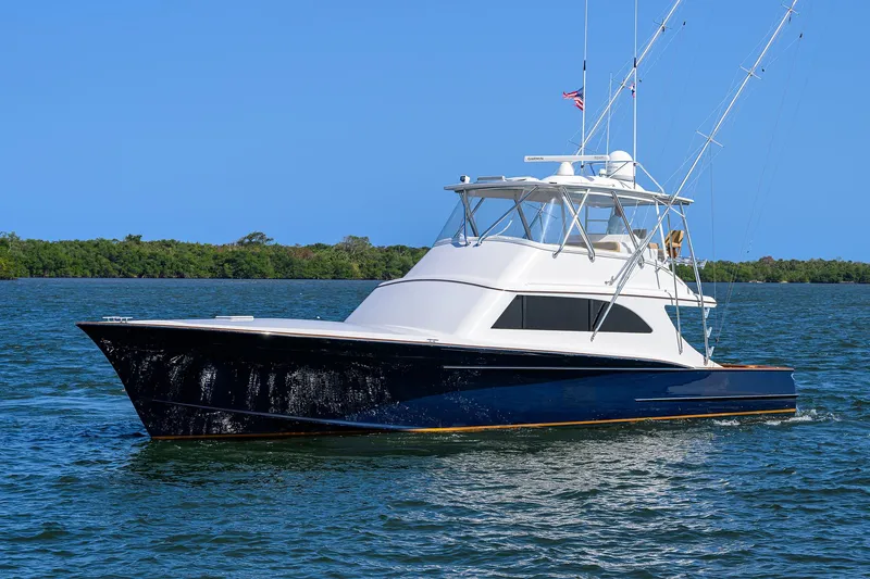  Yacht Photos Pics 2006 Blackwell Custom Carolina yacht on calm water under clear blue sky.