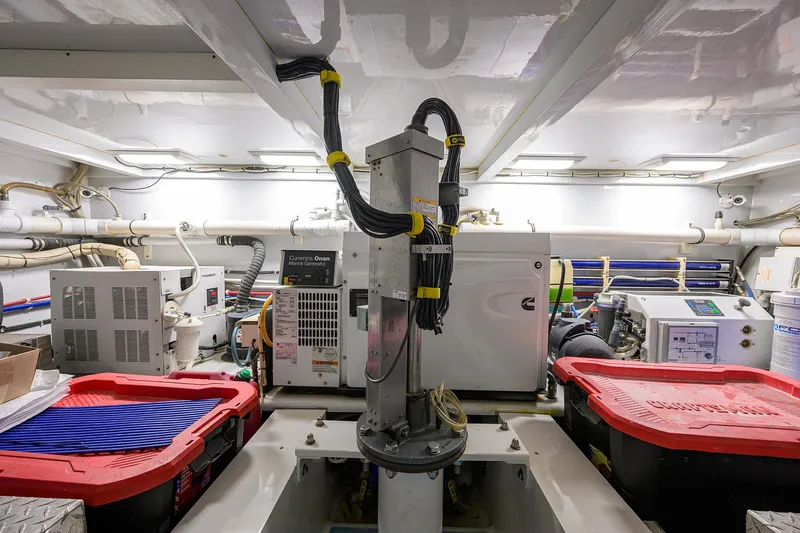  Yacht Photos Pics Engine room of 2006 Blackwell Custom Carolina boat with machinery and storage containers.