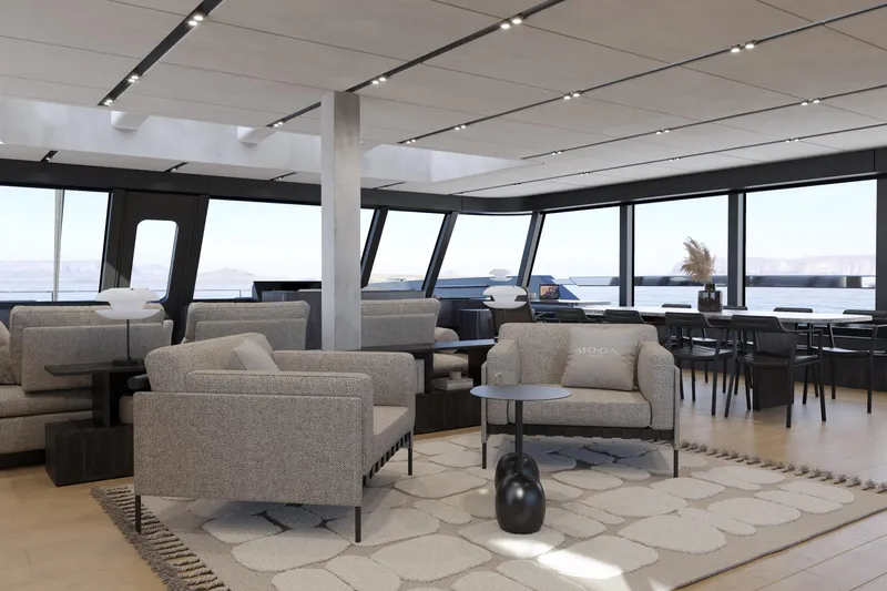  Yacht Photos Pics Luxurious yacht interior with modern seating, large windows, and elegant decor, Moon 100 model, 2025.