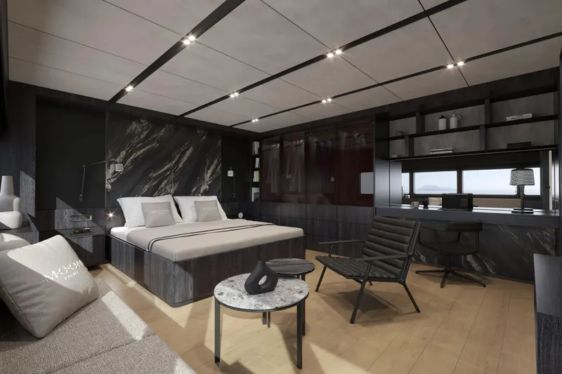  Yacht Photos Pics Luxurious yacht interior with modern design, featuring a bed, seating area, and workspace. Moon 100, 2025.