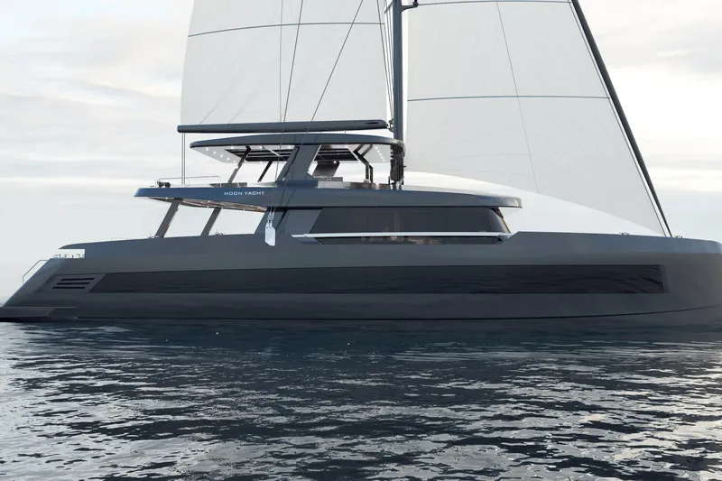  Yacht Photos Pics Futuristic 2025 Moon 100 yacht sailing on calm waters, showcasing sleek design and modern sails.