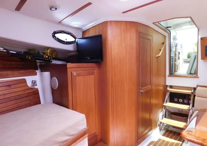  Yacht Photos Pics Interior of a 2009 Back Cove 33 yacht with wooden furnishings.