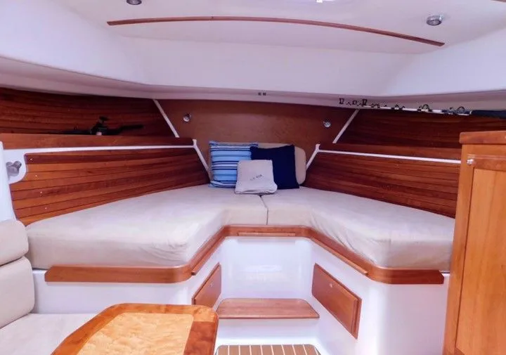  Yacht Photos Pics Interior of a 2009 Back Cove 33 yacht with wood finish.