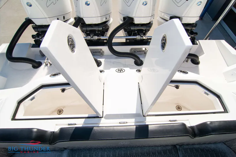  Yacht Photos Pics 2023 Hayaari Marine H44Z boat with open storage compartments and powerful engines.