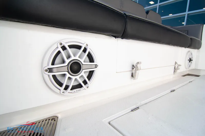  Yacht Photos Pics Hayaari Marine H44Z 2023 boat interior with speaker and cushioned seating.