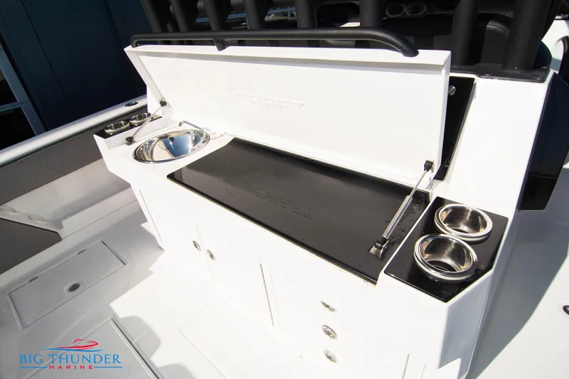  Yacht Photos Pics Hayaari Marine H44Z 2023 model boat with a sleek white console and storage compartments.